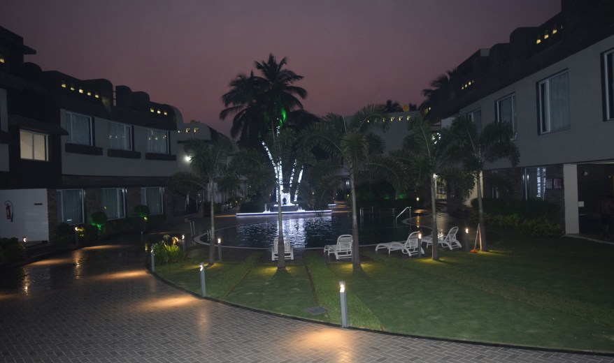 Beautiful setting of rooms around swimming pool 