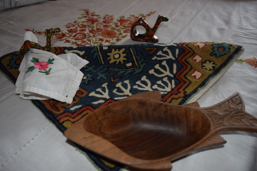 Some of the things I still preserve.. papier mache napkin-holders, cushions, wood bowl, bed-cover